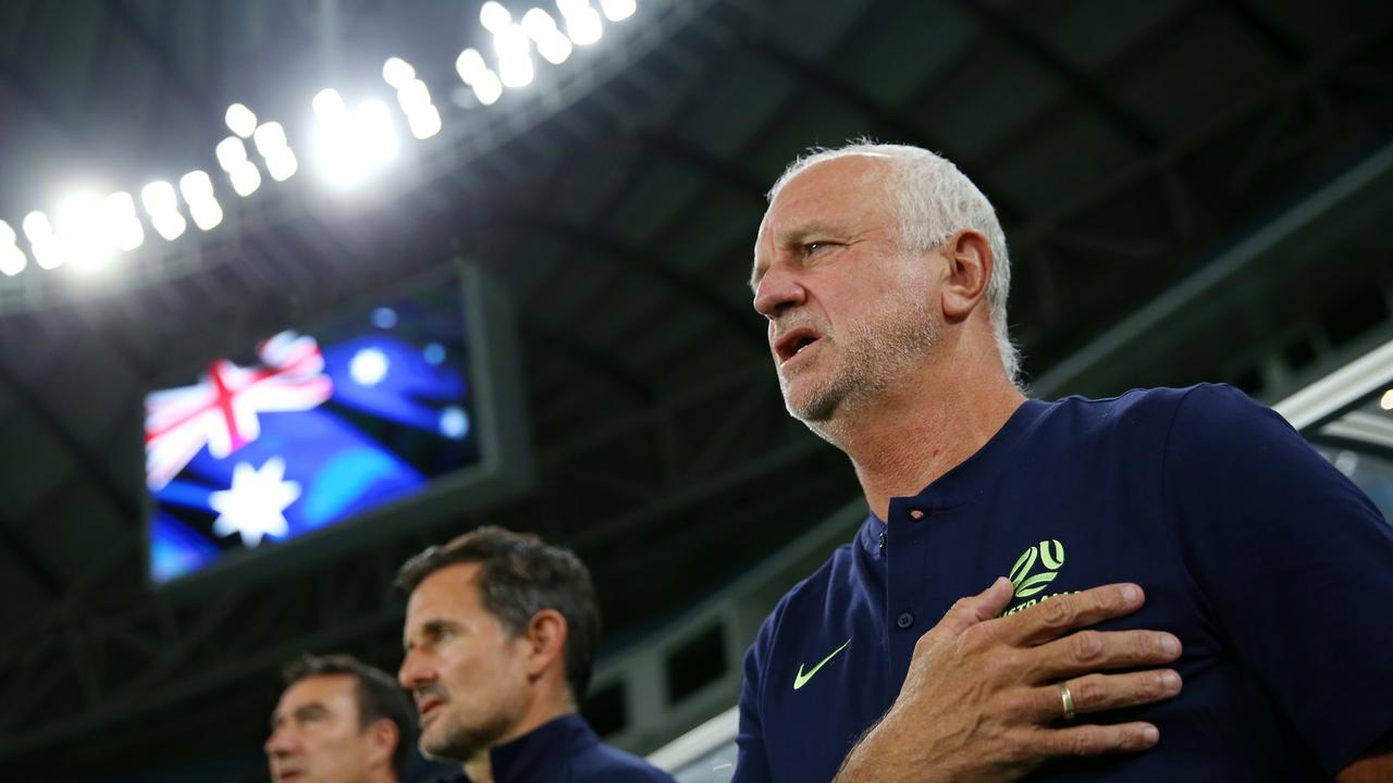 AL WAKRAH, QATAR – JUNE 01: Graham Arnold, Manager of Australia, looks on during the national anthem prior to kick off of the International Friendly match between Jordan and Australia Socceroos at Al Janoub Stadium on June 01, 2022 in Al Wakrah, Qatar. (Photo by Mohamed Farag/Getty Images)