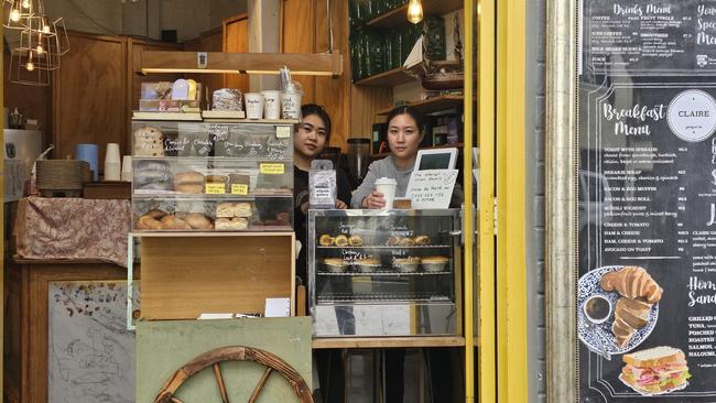 Cafe owner Nat Pitak and a staff member at Cafe Claire in the Sydney inner west suburb of Annandale. Picture: Joseph Lam