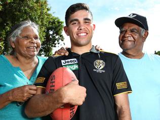 Tyson Stengle 18 (Richmond Football Club recruit) with his grandparents Emily and Cecil Betts, at their home in Ethelton. Tyson Stengle grew up in state care, he has now been drafted to AFL team Richmond. He's back in Adelaide to spend the holidays with his brother and former carers. HIS BROTHER WAS NOT THERE. 23/12/16 Picture: Stephen Laffer