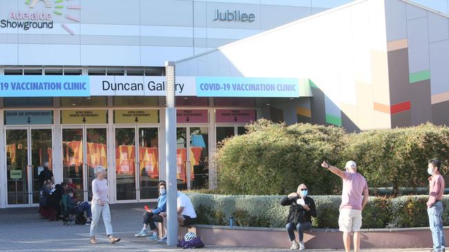 People queuing at the Wayville Showground vax clinic on Tuesday, December 28. Picture: Emma Brasier