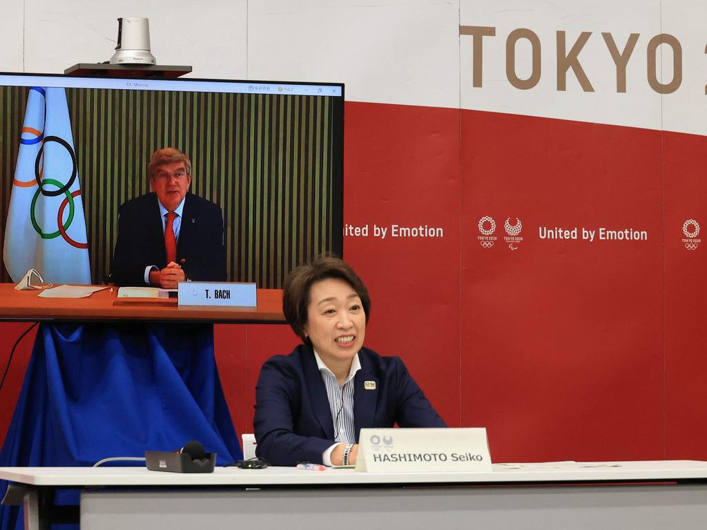 IOC president Thomas Bach speaks to Tokyo 2020 Organising Committee president Seiko Hashimoto.