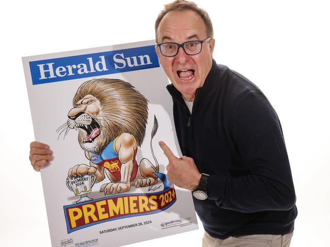 Herald Sun cartoonist Mark Knight  with his 2024 AFL Premiership Poster of the Brisbane Lions. Picture: Ian Currie