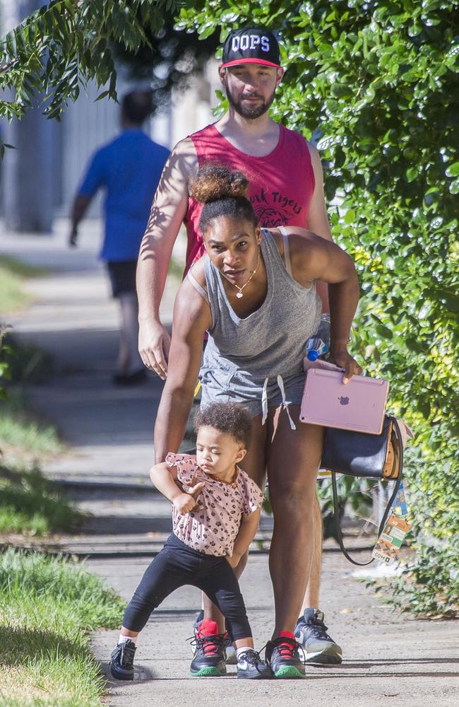 Serena Williams holds daughter Alexia Olympia, 1 as husband Alexis Ohanian watches on. Picture: Media Mode