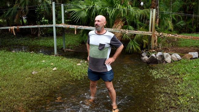 Craig Bartrop rescued his neighbours Kim Love and son Cameron, 16, from rushing flood water from their Balgal Beach home. Picture: Evan Morgan