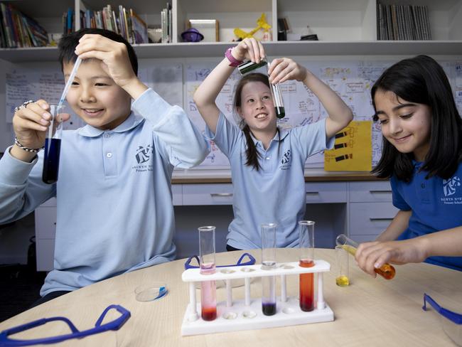 Wednesday 4th December 2024.  The Australian.  Curtis Lai, Charlotte Gorey and Ava Asadpour in the Science Shed at Balwyn North Primary School.Photograph by Arsineh Houspian.