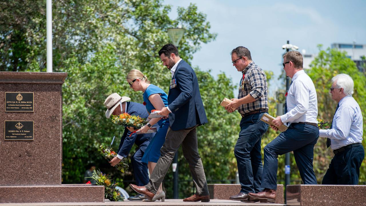 L-R Mark Monaghan, Nicole Manison, Brent Potter, Luke Gosling, Paul Kirby and Kon Vatskalis paid tribute at the Darwin Cenotaph with the laying of wreaths, 2023. Picture: Pema Tamang Pakhrin