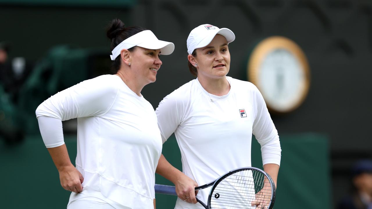 A couple of Aussie legends enjoying a day out at Wimbledon. (Photo by Clive Brunskill/Getty Images)