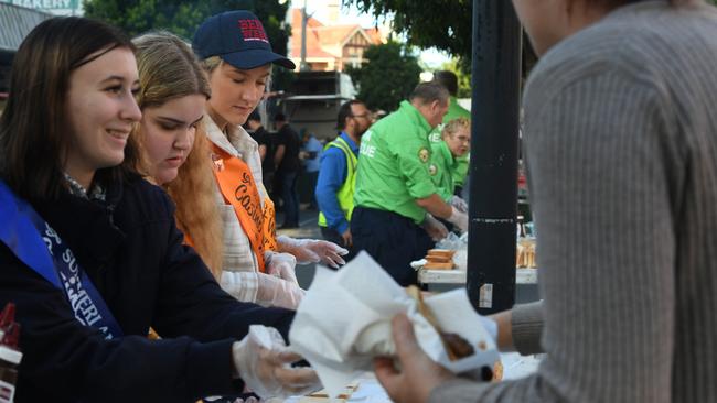 Beef Week Queen Taylor Dawson with Beef Week Beauties Sarah Jones and Makenzi Chadburn serving up steak and snag sangas at Breakfast with the Butchers. Picture: Cath Piltz