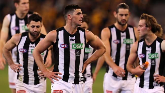 Collingwood skipper Scott Pendlebury leads his teammates off the MCG after Sunday’s loss to Hawthorn. Picture: Michael Klein