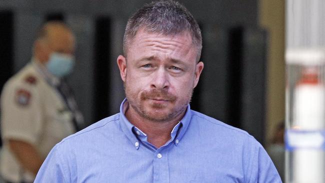 Simon John Hickey outside the District Court in Brisbane, where he is on trial for allegedly sharing the video of the Christchurch massacre.