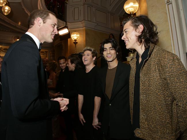 Royal touch...Prince William greets 1D after the Royal Variety Performance in London last week. Picture: Splash News