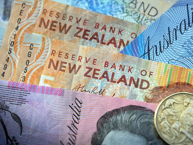 Strategists are taking unusual steps to predict the future moves of commodity currencies, such as the Australian and New Zealand dollars, against the U.S. dollar. PHOTO: BLOOMBERG NEWS