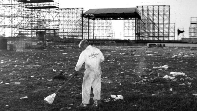 Cleanevent's Paul Barrett on the rake cleaning up Wayne’s mess. Picture: Rob Baird/HWT Archives