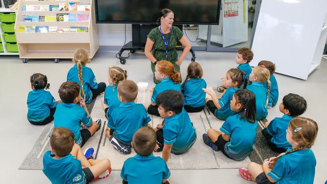 Transition teacher Nicole Robson and her class on the first day of school at Zuccoli Primary. Picture GLENN CAMPBELL