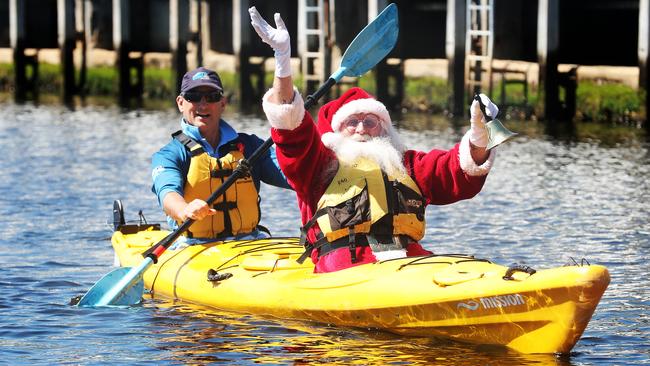 Santa with Reg Grundy from Roaring 40s Kayaking. Picture: Nikki Davis-Jones