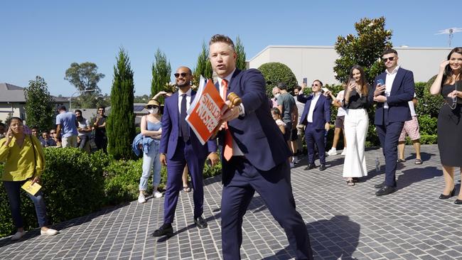 Auctioneer Stu Benson at a recent auction in Kellyville, an area that has been on the up.