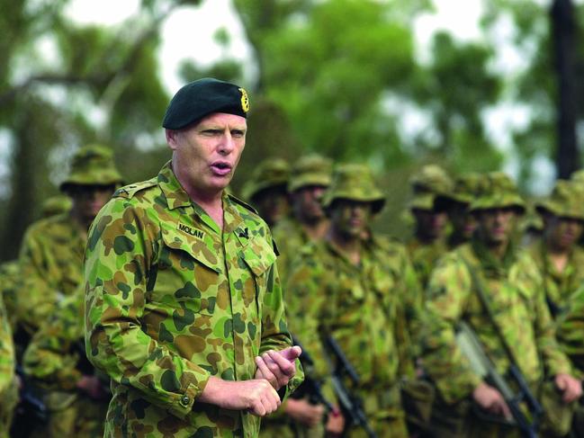 TWAM-20180224 EMBARGO FOR TWAM 24 FEB 2018NO REUSE WITHOUT PERMISSIONPIC BY CPL JASON WEEDING 15 Major-General Andrew James (Jim) Molan AO, Commander of the deployable joint force headquarters 1st Division, addresses logistic troops from 3rd Brigade Administrative Support Battalion (3BASB) after their three weeks combined arms training activity (CATA) supporting unites and sharpening their bush skills at high range training area, 15/03/2001. Pic Corporal Jason Weeding.