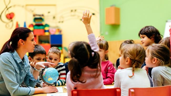 RendezView. Childcare teacher teaching her children about geography. (Pic: iStock)