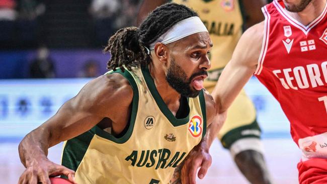 Patty Mills chose to look at the bigger picture. (Photo by Yuichi YAMAZAKI / AFP)