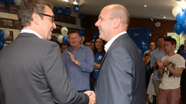 Sam Duluk with Premier Steven Marshall in 2015. Picture: Naomi Jellicoe