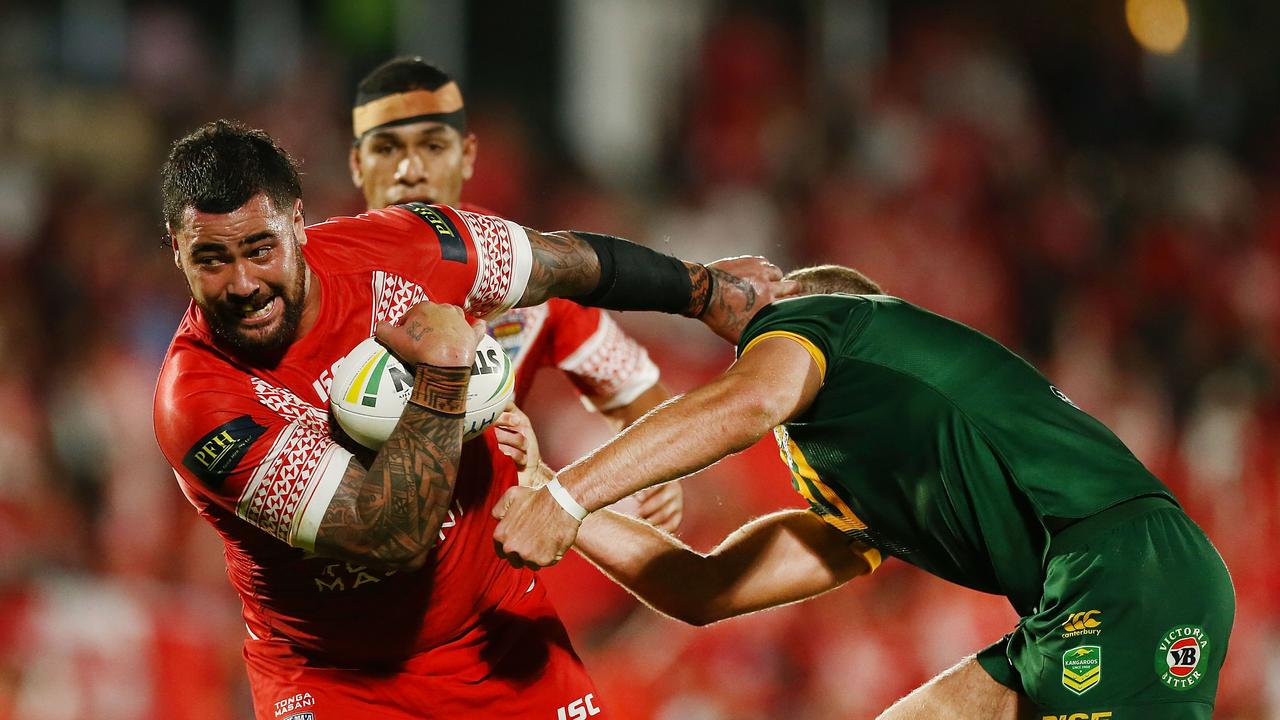Andrew Fifita of Tonga fends off Tom Trbojevic
