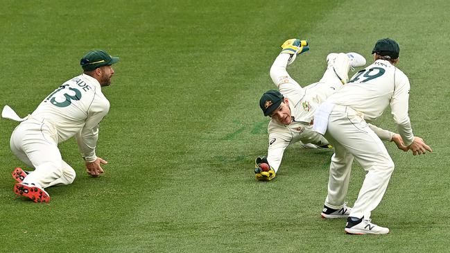 Tim Paine takes a brilliant catch to dismiss Cheteshwar Pujara. Picture: Getty Images