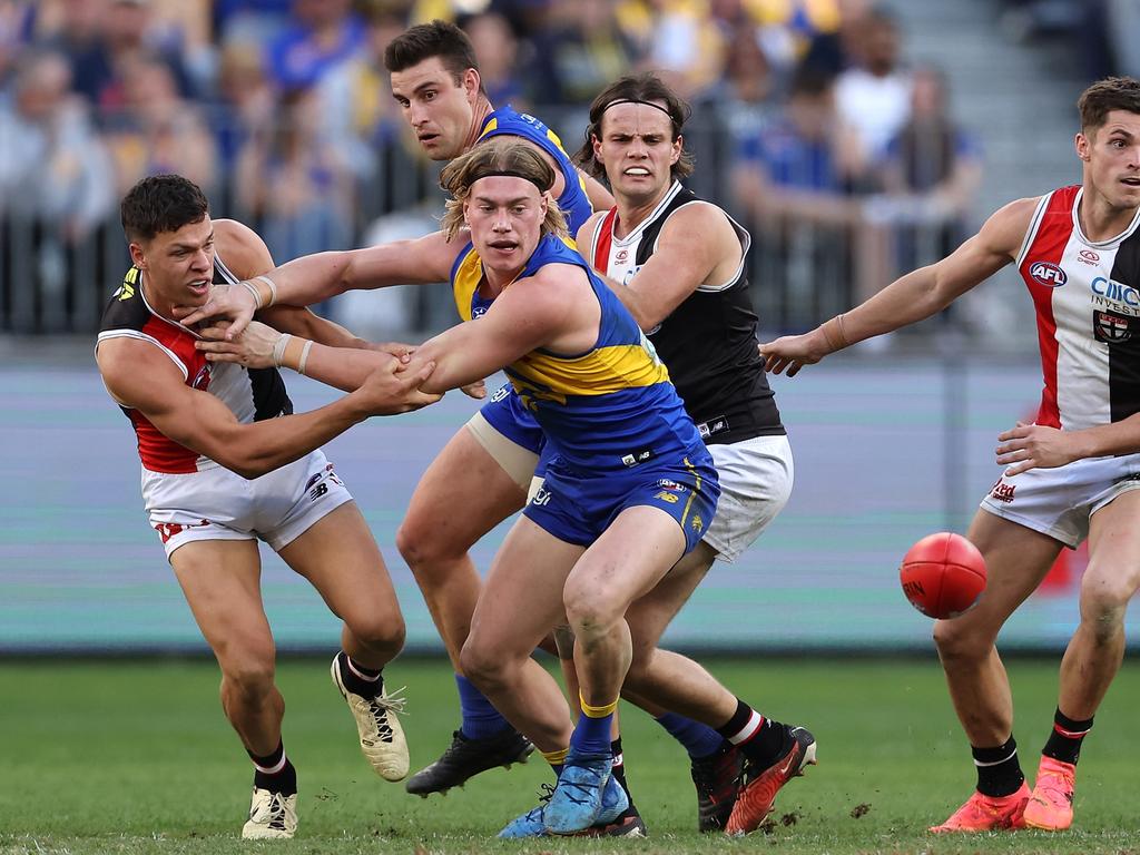 St Kilda’s Marcus Windhager (left) grabs a hold of West Coast’s Harley Reid. Picture: Paul Kane/Getty Images