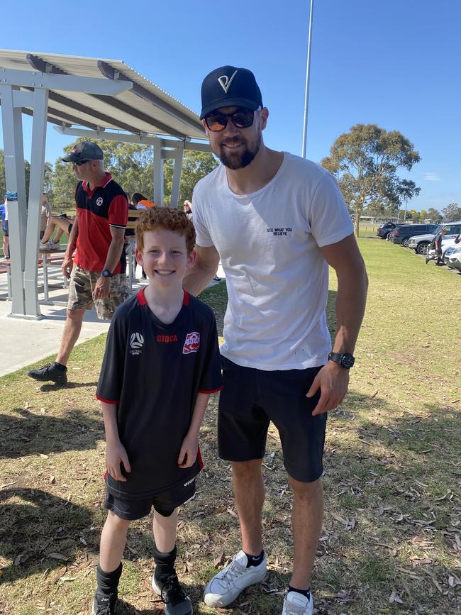 Socceroos captain Maty Ryan and Xavier Mobbs from Nepean FA in Penrith on Sunday.