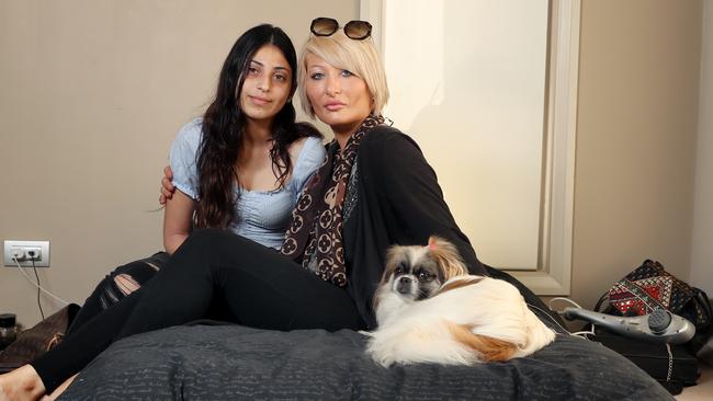 Mary Saad with her daughter Mia, back in the home they were evicted from. Picture: Richard Dobson