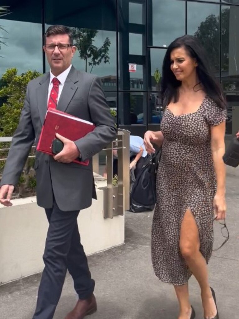 Ex-reality TV star Suzi Taylor leaving the courthouse with lawyer Michael Gatenby. Picture: Jessica Paul