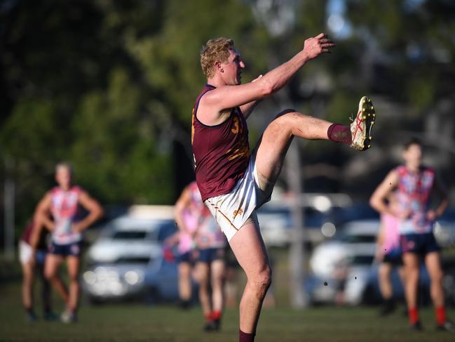 Palm Beach Currumbin Lions QAFL player Jon Croad was told he would never play again after breaking his tibia and fibula. He came back anyway. Pictures: Highflyer Images