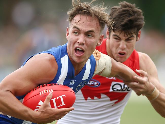 COFFS HARBOUR, AUSTRALIA - FEBRUARY 19:  Ryan Clarke of the Kangaroos in action during the 2017 JLT Community Series match between the Sydney Swans and North Melbourne Kangaroos at Coffs Harbour International Stadium on February 19, 2017 in Coffs Harbour, Australia.  (Photo by Mark Metcalfe/AFL Media/Getty Images)