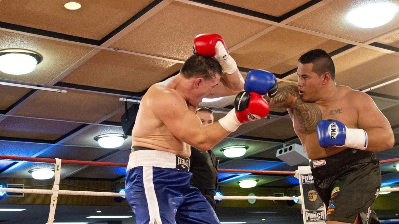 Paul Gallen and Herman Ene-Purcell fight it out in Toowoomba. Friday, Jan 29, 2016.