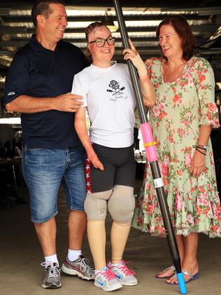 Sophie Delezio, pictured with her parents, has a passion for rowing.