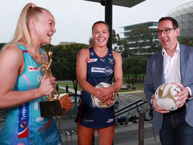 Minister for Tourism, Sport and Major Events Steve Dimopoulos with Kate Moloney of the Melbourne Vixens and Tayla Fraser of the Melbourne Mavericks. Picture: Getty