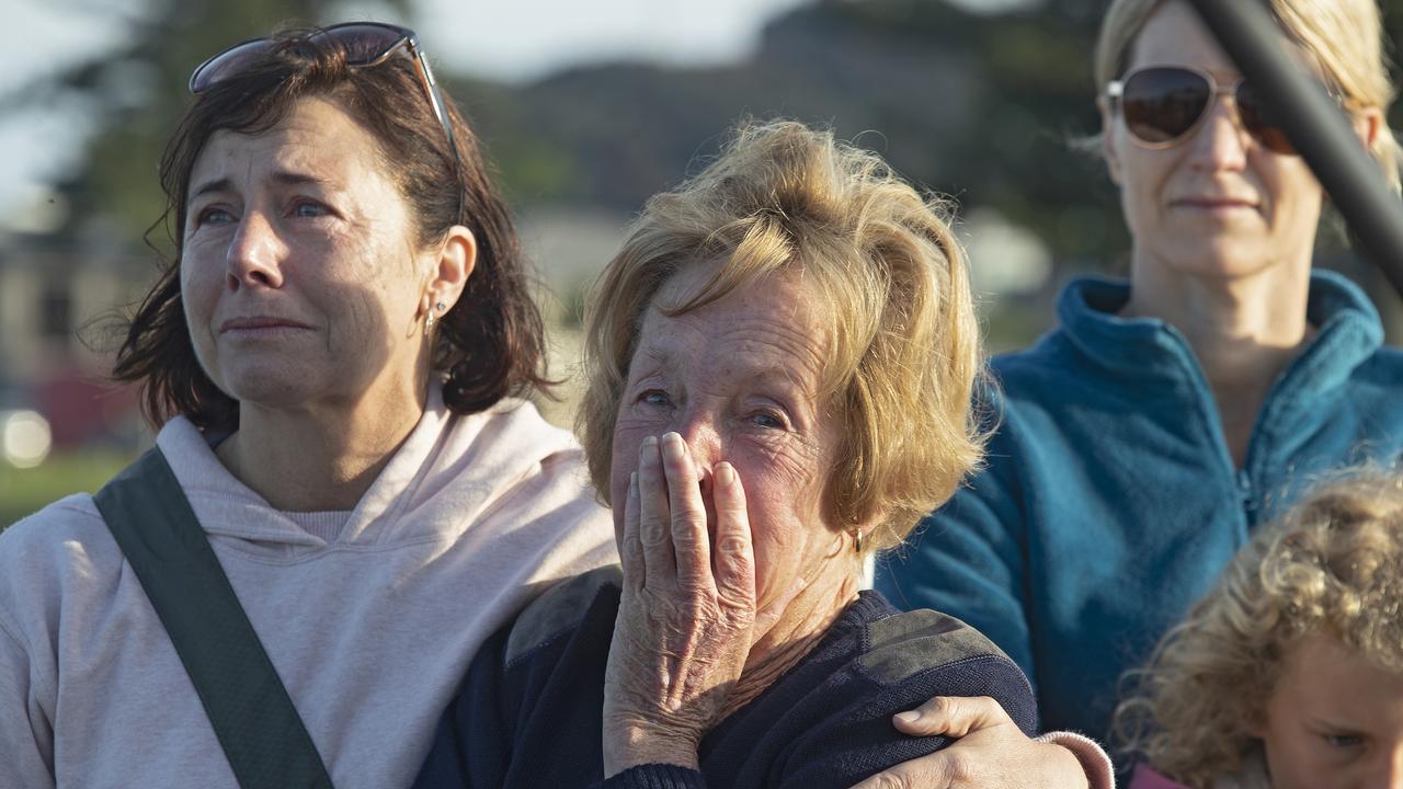 It was a ‘sombre’ and ‘very emotional’ scene as the ship left. Picture: John Boren/Getty Images.