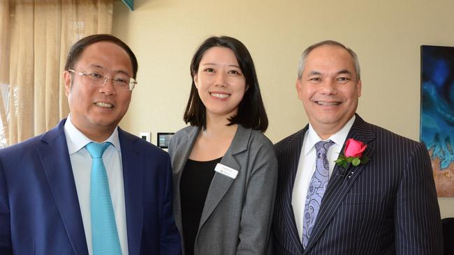 Yuhu Group spokeswoman Jingxin Lin with Gold Coast Mayor Tom Tate at Jewel triple towers’ topping out ceremony recently when all three towers reached their full height on the Surfers Paradise beachfront. Picture: Regina King