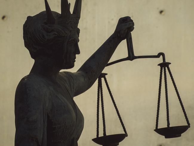 BRISBANE , AUSTRALIA - NewsWire Photos - BRISBANE , JUNE 24 2024: Generic photo of the scales of justice stature outside Brisbane Supreme Court in the Brisbane CBD. Picture: NewsWire / Glenn Campbell