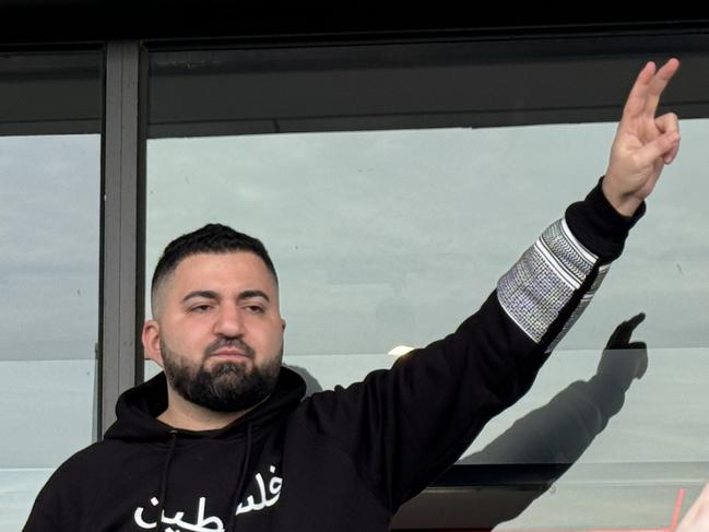 Hash Tayeh addressing protesters outside the Coburg North Burgertory Picture: Olivia Jenkins