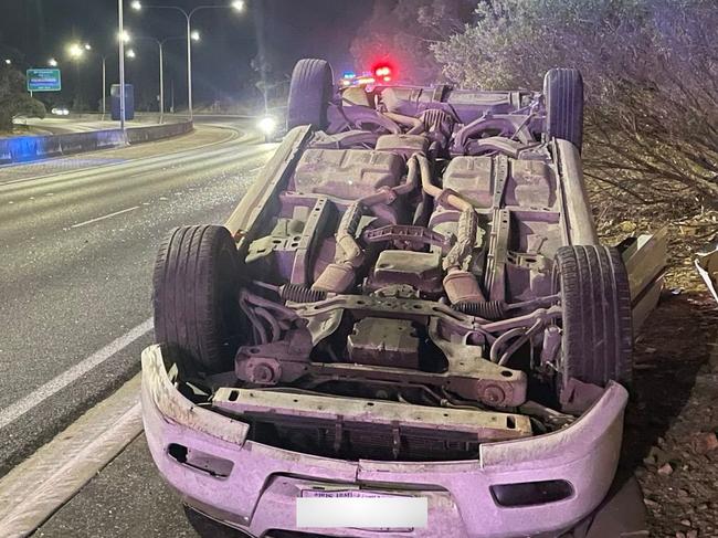 The white Holden sedan rolled on the Freeway on Monday evening. Picture: SA Police