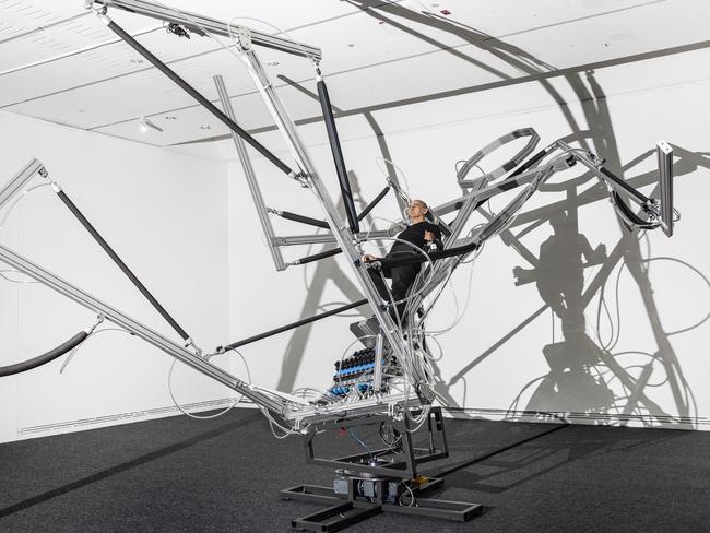 StelarcStelarc with his work Reclining Stickman, 2020 Adelaide Biennial of Australian Art: Monster Theatres; photo: Saul Steed.