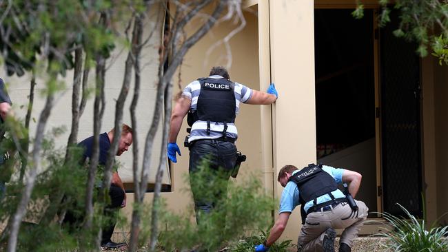 Police at the scene at Kumnick Street, Upper Coomera where there was a shooting last night involving a Rebels bikie Gokhan Turkyilmaz. Pics Adam Head