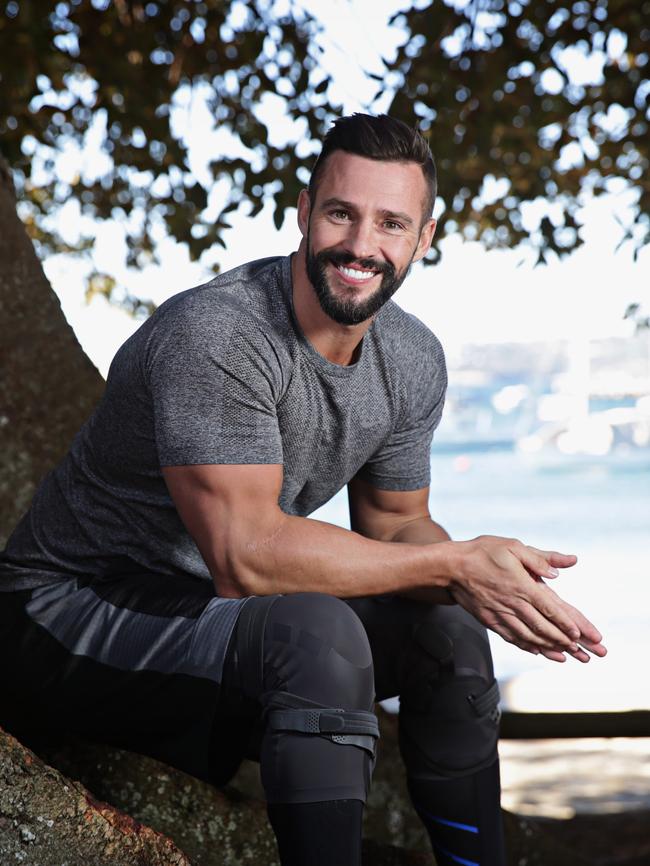 Smith wearing his knee braces at Balmoral Beach. Picture: Adam Yip