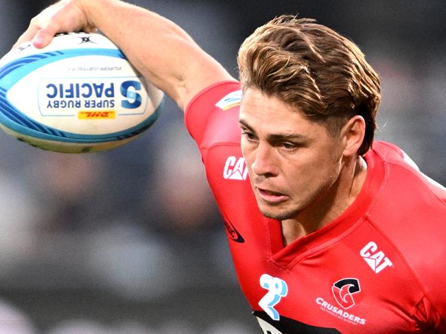 CHRISTCHURCH, NEW ZEALAND - FEBRUARY 14: James O'Connor of the Crusaders charges forward during the round one Super Rugby Pacific match between Crusaders and Hurricanes at Apollo Projects Stadium, on February 14, 2025, in Christchurch, New Zealand. (Photo by Joe Allison/Getty Images)