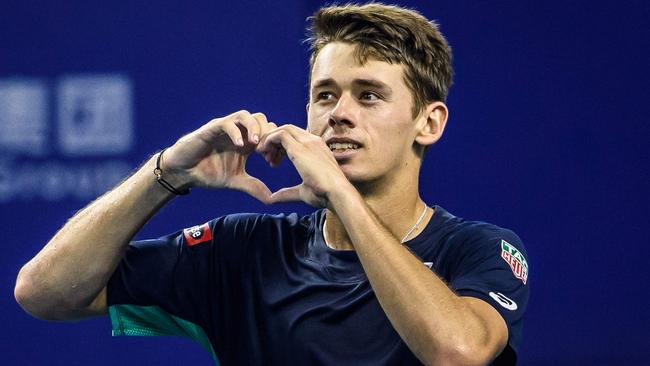 Alex de Minaur of Australia celebrates his victory in the men's singles final match against Adrian Mannarino of France at the Zhuhai Championships tennis tournament in China's southern Guangdong province in September. Picture: STR / AFP