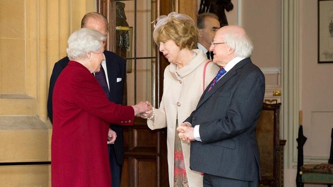 The Queen and Prince Philip bid farewell to Irish President Michael D. Higgins and his wife Sabina at the end of their official visit to Windsor Castle in 2014. Picture: Leon Neal