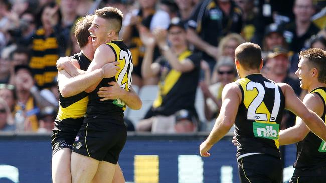 Jack Higgins celebrates after kicking his first AFL goal. Picture: Michael Klein