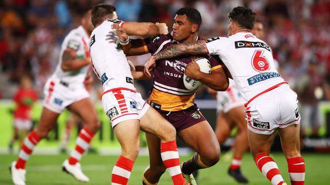 SYDNEY, AUSTRALIA — MARCH 08: Tevita Pangai of the Broncos is tackled during the round one NRL match between the St George Illawarra Dragons and the Brisbane Broncos at UOW Jubilee Oval on March 8, 2018 in Sydney, Australia. (Photo by Mark Kolbe/Getty Images)