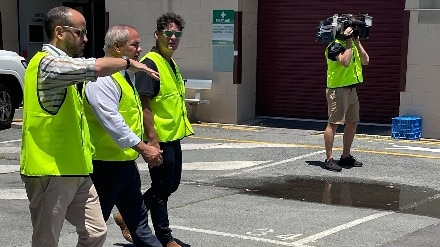 Film producer Schuyler Weiss with Mayor Tom Tate and Gold Coast councillor Nick Marshall inspecting the council Miami depot which will become a creative film precinct.