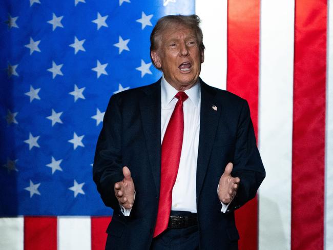 ST CLOUD, MINNESOTA - JULY 27: U.S. Republican Presidential nominee former President Donald Trump arrives to speak during a rally at Herb Brooks National Hockey Center on July 27, 2024 in St Cloud, Minnesota. Trump hopes to flip the state of Minnesota this November, which hasn't been carried by a Republican in a presidential election since 1972.   Stephen Maturen/Getty Images/AFP (Photo by Stephen Maturen / GETTY IMAGES NORTH AMERICA / Getty Images via AFP)